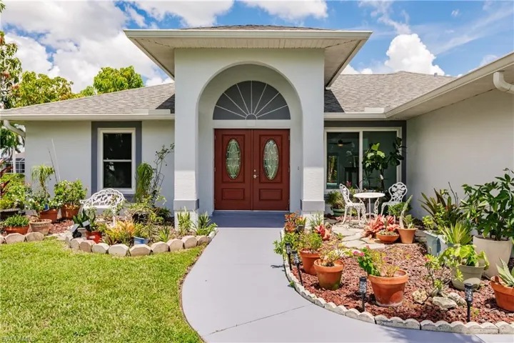 Property entrance with a lawn