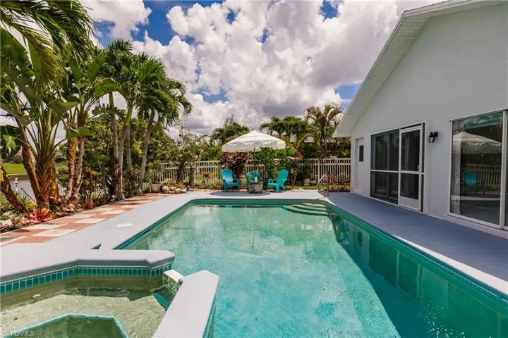 View of swimming pool with a patio area
