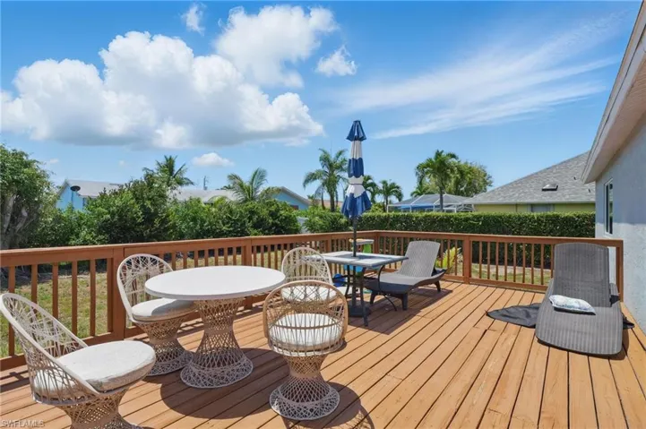 Wooden terrace with outdoor dining space