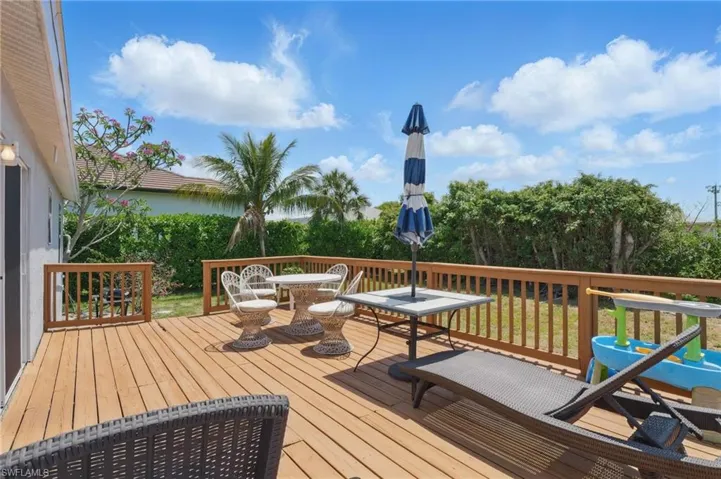 Wooden deck with outdoor dining space