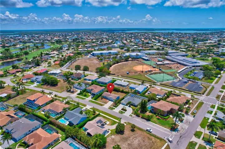 Bird's eye view with a water view and a residential view