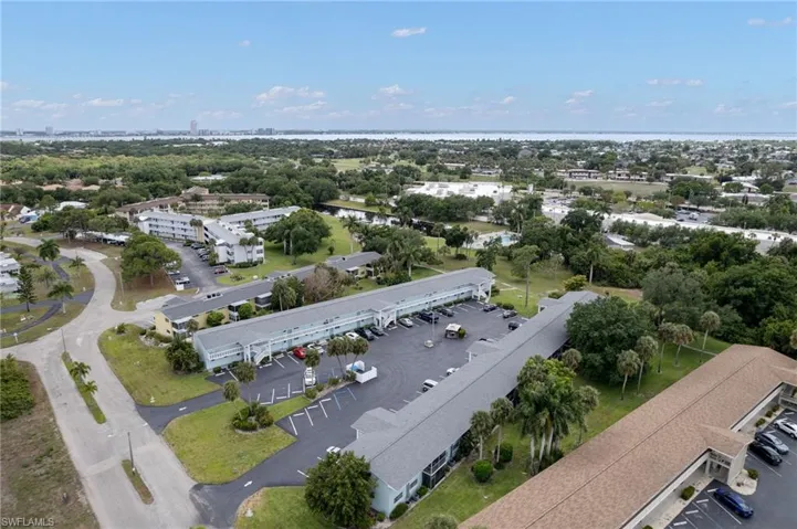 Publix supermarket in the background.  Less than 1 mile away.  Walking distance to Condo.  There is also a Dollar General, a few restaurants and a little resale boutique.