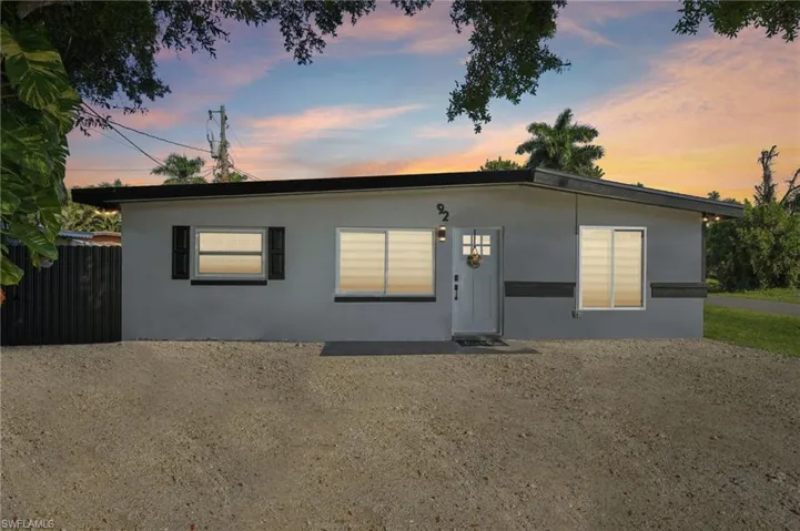 View of front of property featuring stucco siding