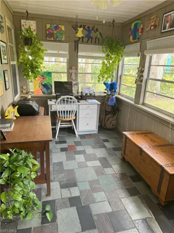 Sunroom / solarium featuring plenty of natural light
