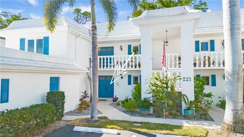 View of front of home featuring a balcony