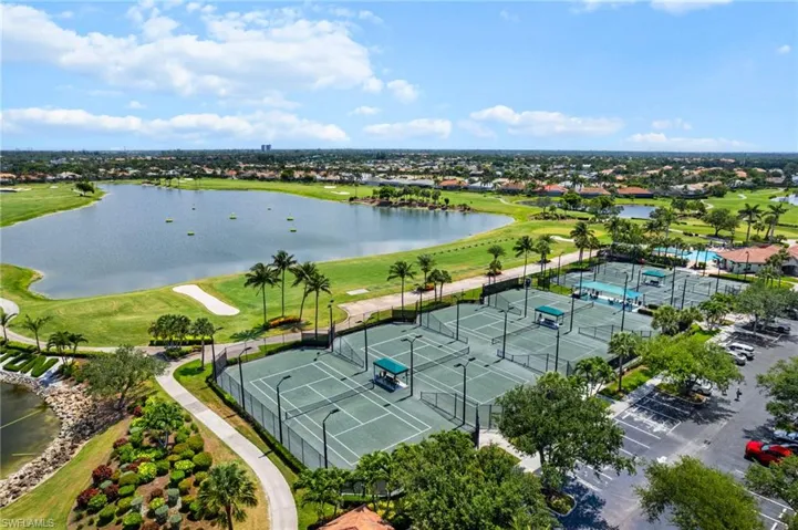 Aerial view of a nearby body of water and a local golf course