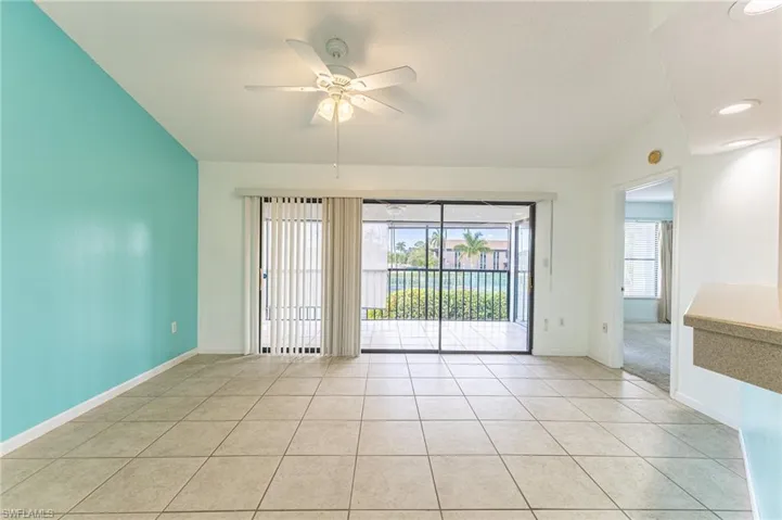 Spare room with light tile patterned flooring, ceiling fan, and recessed lighting
