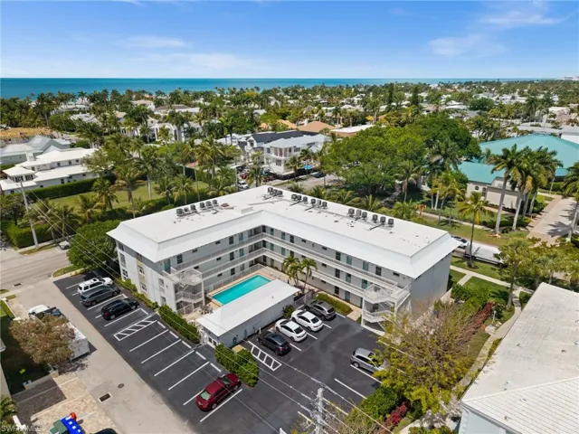 Aerial of building with Gulf nearby