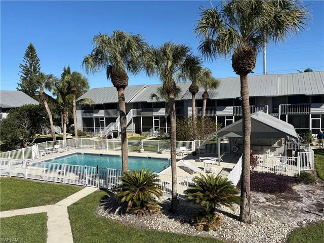 Community pool featuring a patio area