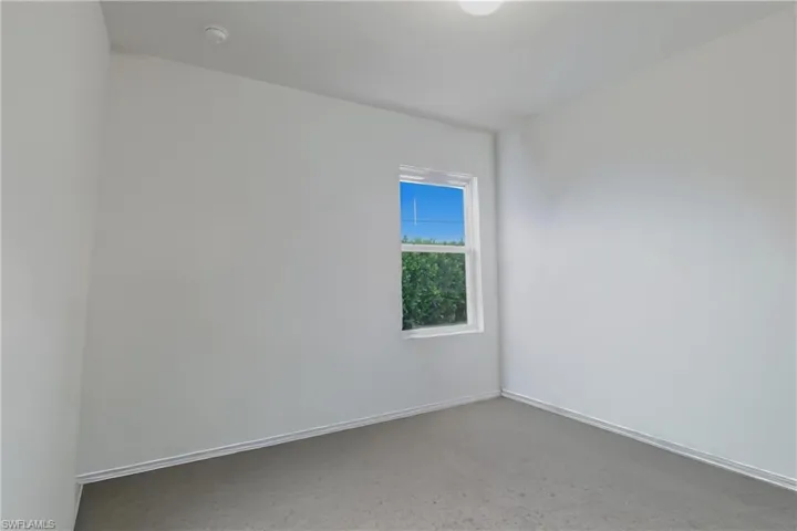 Spare room with baseboards
