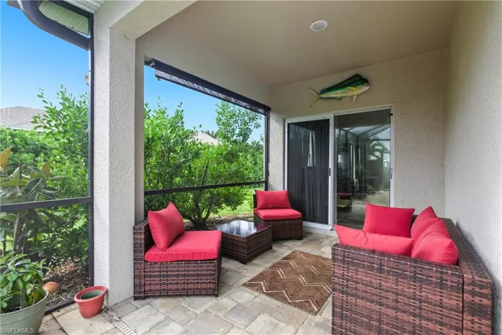 Sunroom with an outdoor hangout area and a patio