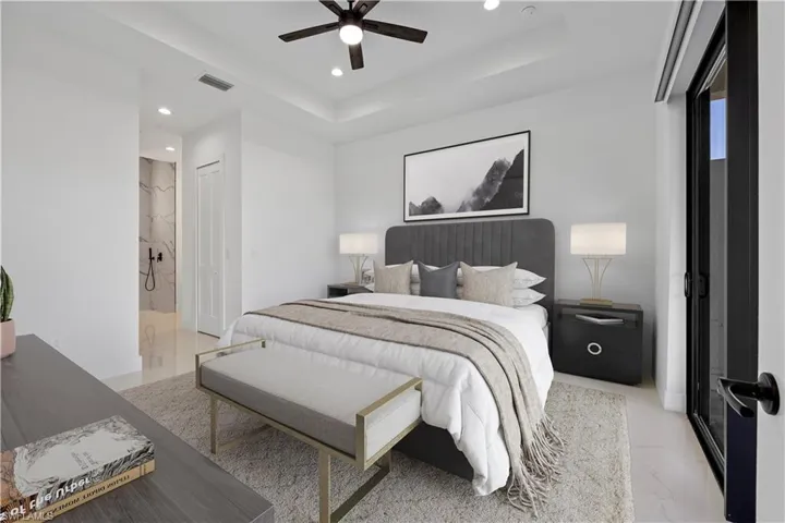Virtually Staged-Bedroom featuring visible vents, marble finish floor, a tray ceiling, ensuite bath, and recessed lighting