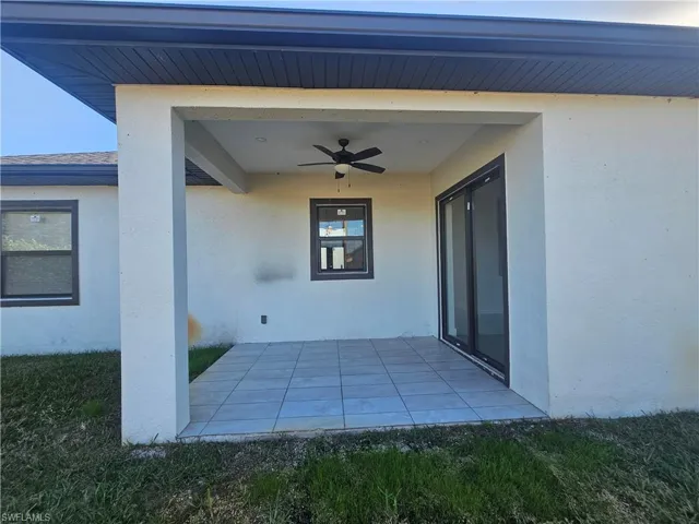 View of patio featuring a ceiling fan