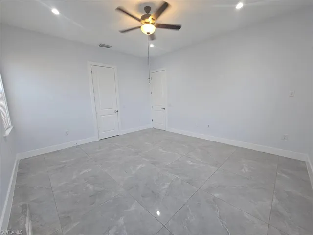 Unfurnished bedroom featuring recessed lighting and a ceiling fan