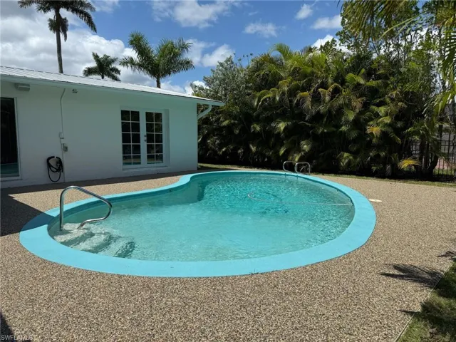 Outdoor pool featuring a patio area