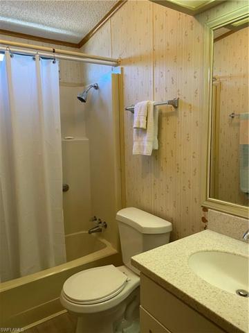 Guest bath with tub/shower combo. The jalousie window in the tub does not close and will not be repaired.