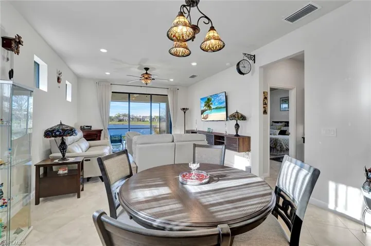 Dining room with light tile patterned floors