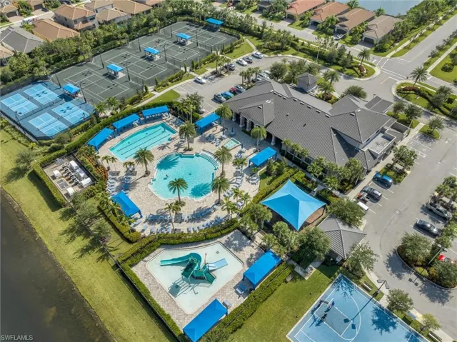 4 Pickleball and 4 tennis courts with night lights and stands for tournament viewing  Drone / aerial view