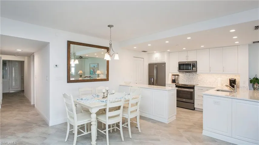 Dining space featuring sink
