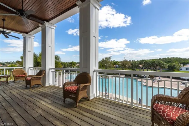 Wooden deck featuring ceiling fan