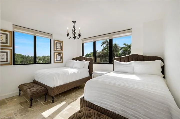 Guest Bedroom with two full size beds and ensuite