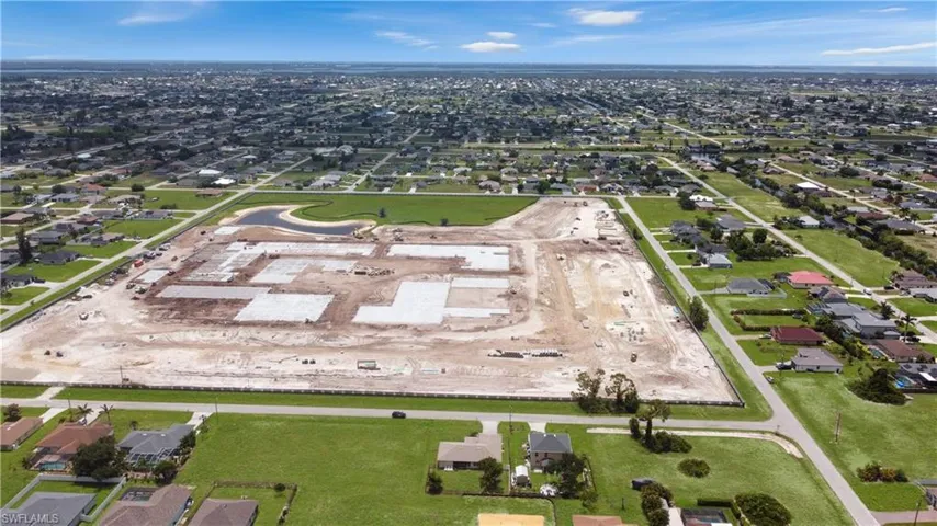 View of property location with nearby suburban area