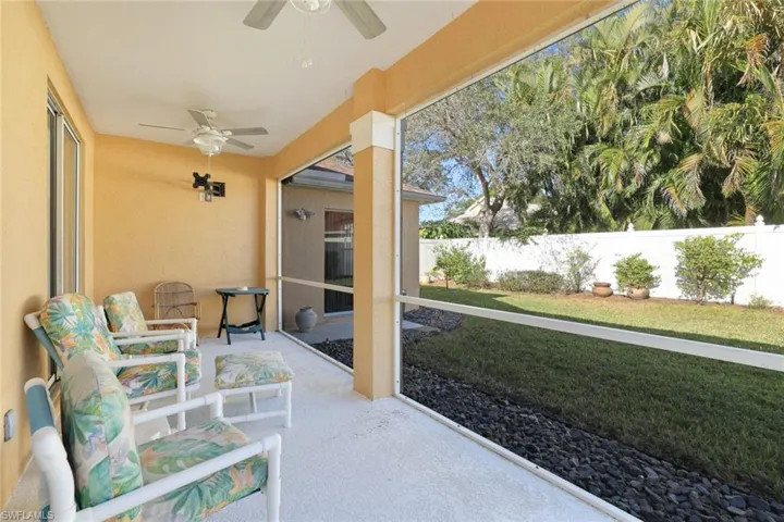 View of patio featuring ceiling fan