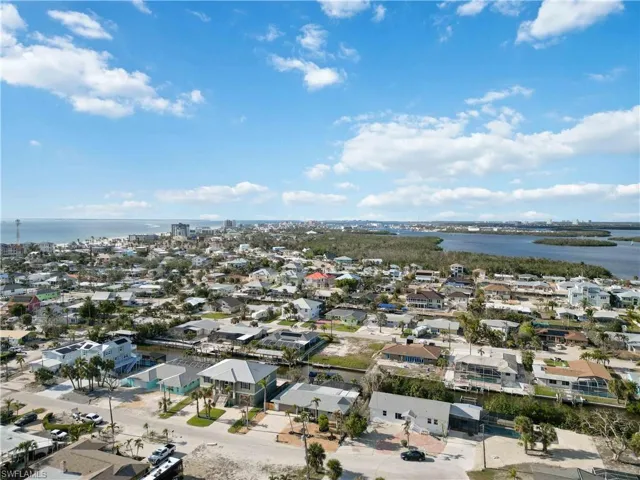 Bird's eye view with a water view and a residential view