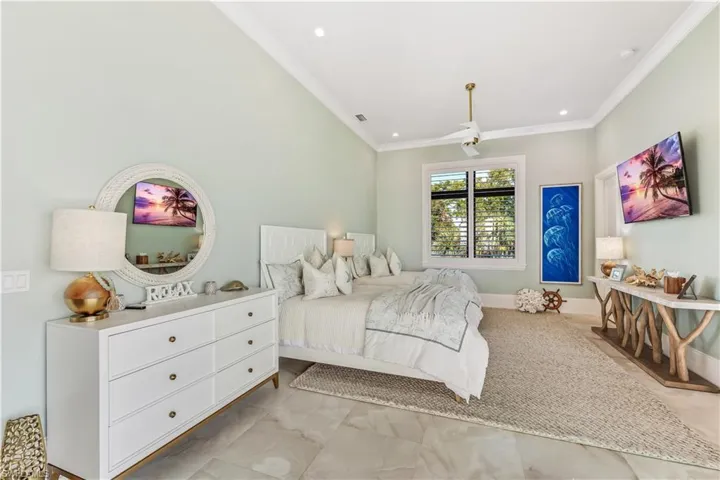 Bedroom with ornamental molding