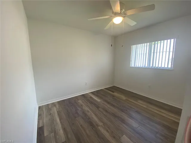 Front guest bedroom has ceiling fan and LVP floor