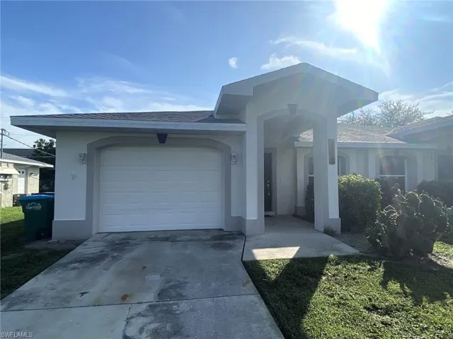 SE Cape Coral Duplex featuring 3 bedrooms, 2 baths and 1 car garage