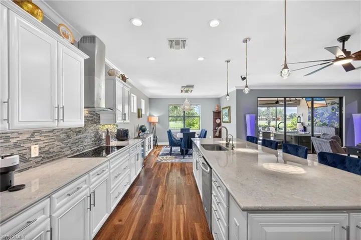 White Cabinetry & Sand Colored Silestone Quartz Countertops