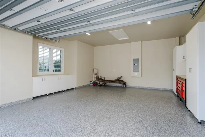 Cabinets and epoxy floors in garage