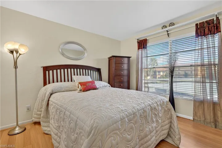 Bedroom with light wood-style floors
