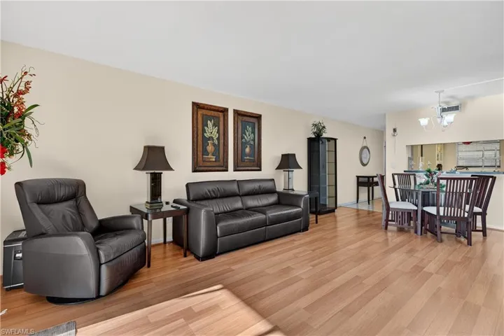 Living area with light wood-type flooring