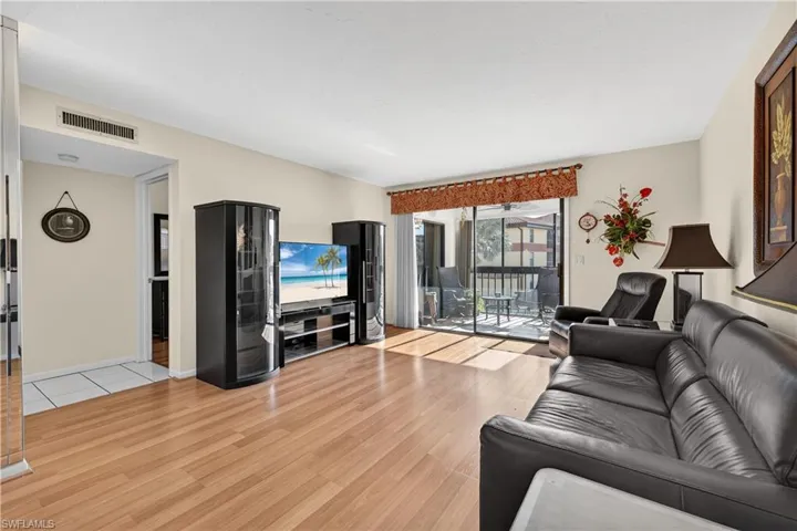 Living area with light wood-style floors