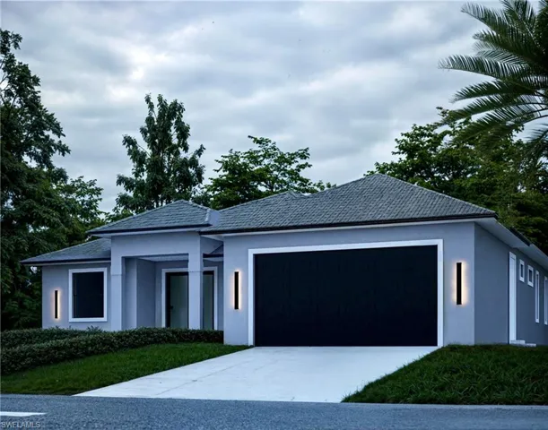 Contemporary exterior with a two-car garage, concrete driveway, architectural shingle roof, and modern exterior lighting fixtures