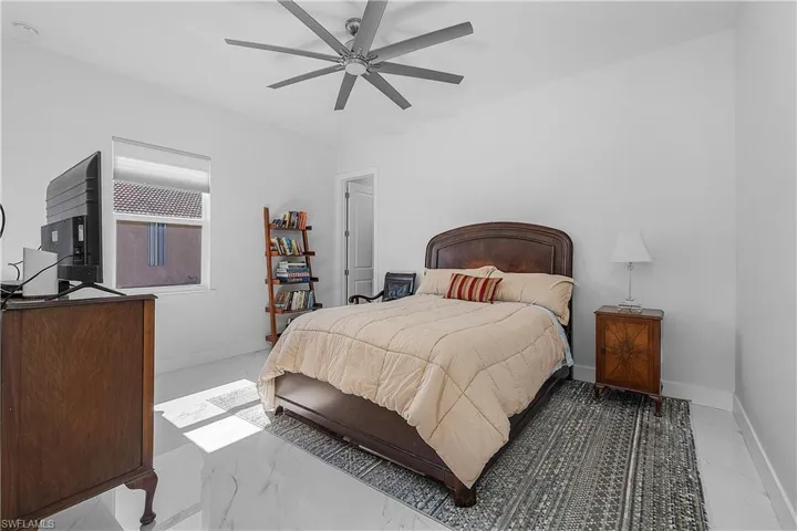 Bedroom featuring ceiling fan