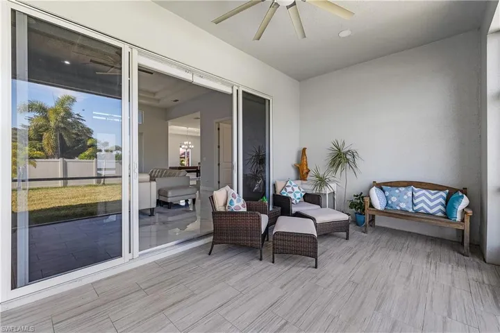 View of lanai featuring a ceiling fan