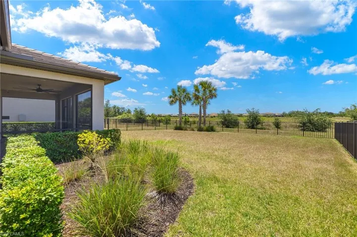 View of yard featuring ceiling fan