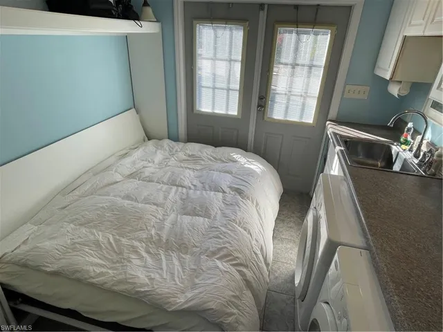 Bedroom with washer / dryer