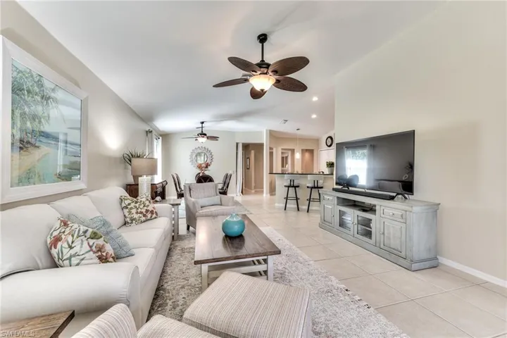 Tiled living room with ceiling fan