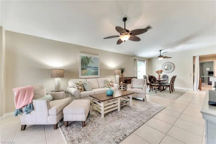 Tiled living room with ceiling fan