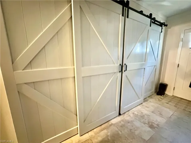 Washer & Dryer behind Barn Doors
