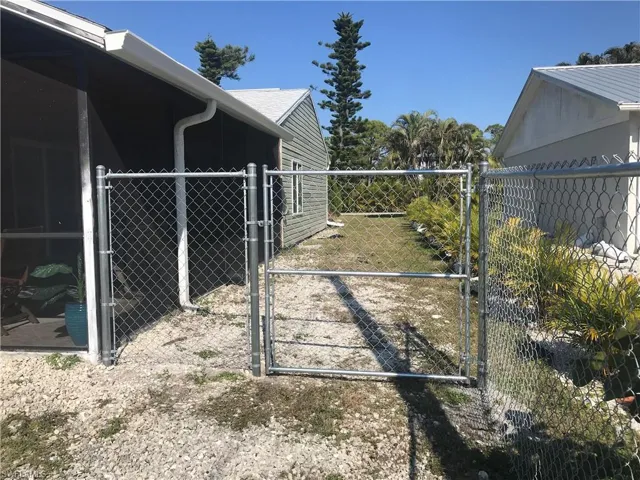 East side with fence/gate