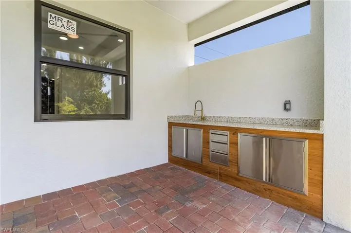View of patio / terrace featuring an outdoor kitchen