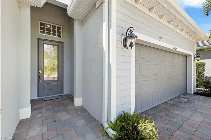 Front door and 2 stall garage