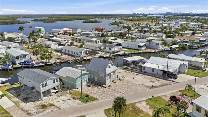 Aerial view of residential area with a nearby body of water
