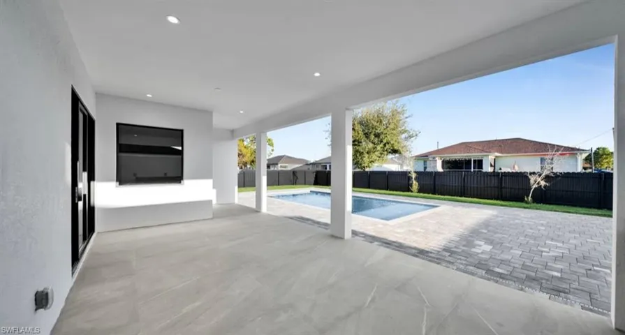 View of pool featuring a patio area and a fenced backyard