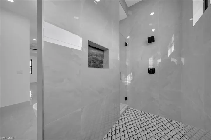 Bathroom featuring a shower stall